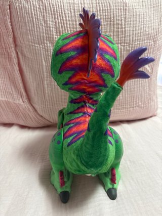 Muñeco dinosaurio electrónico verde