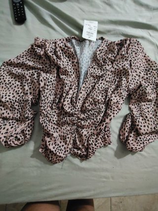 Blusa animal print manga larga