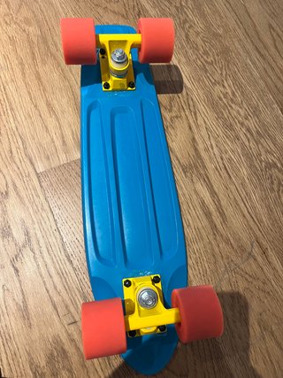 Monopatín Decathlon PVC 55cm Azul Naranja