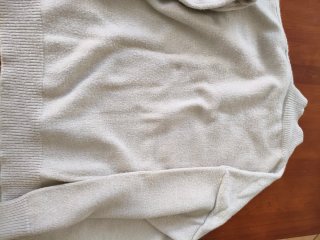 Jersey cuello alto trenzado