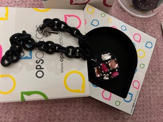 Orologio e bracciale nero e rosa