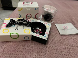 Orologio e bracciale nero e rosa