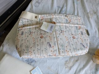 Lote accesorios bebé: osito, cambiador, saco