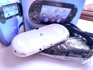 PS Vita Slim Blanca cómo Nuevo.