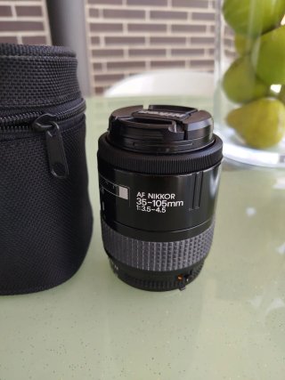 Objetivo Nikon con funda Sigma