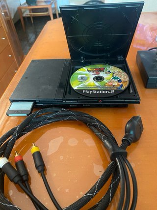 PS2 Slim Negra + 2 Juegos
