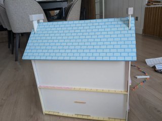Casita de muñecas de madera