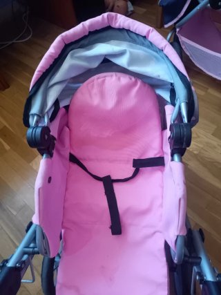 Carrito de muñecos de bebé rosa y gris lunares