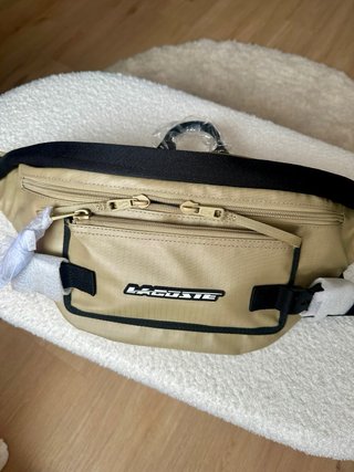 Riñonera Lacoste Beige. Totalmente original.