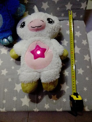 Peluches con proyector de luces y estrellas