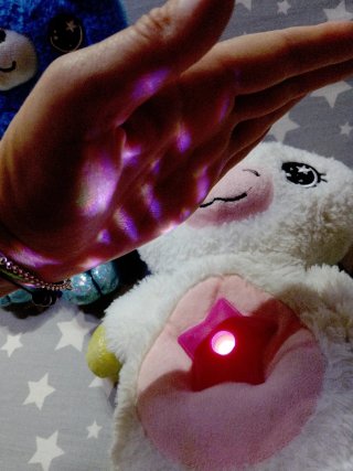 Peluches con proyector de luces y estrellas