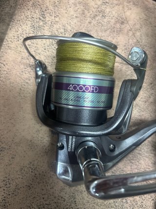 Caña de pesca con carrete para  embarcación