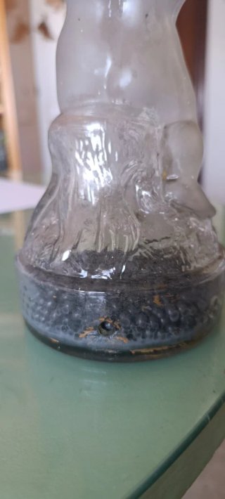 Pie de lámpara de cristal con reloj