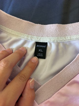 Camiseta deportiva rejilla rosa y blanca