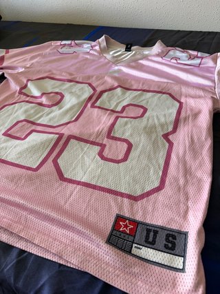 Camiseta deportiva rejilla rosa y blanca