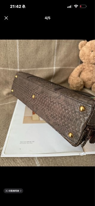 Bolso de piel efecto serpiente