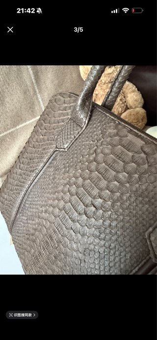 Bolso de piel efecto serpiente
