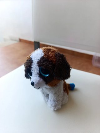Peluche perro ojos grandes
