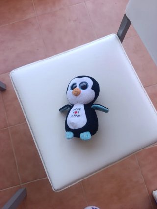 Peluche perro blanco y marrón