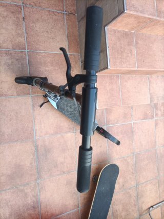 Patinete Oxelo Gris Poco uso.