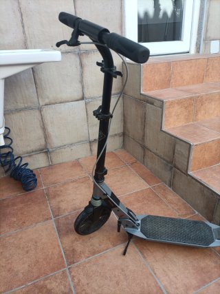 Patinete Oxelo Gris Poco uso.