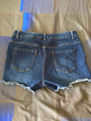 Shorts vaqueros bajos desflecados