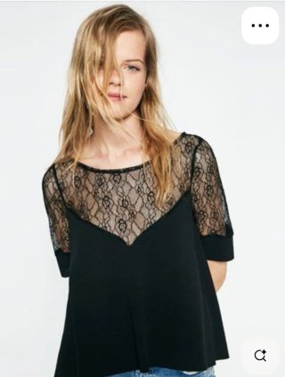Blusa blanca de Zara combinada con Encaje