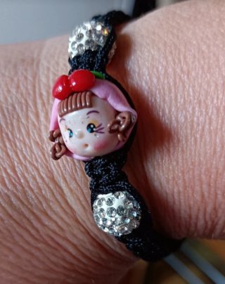 Braccialetto con bambola e strass