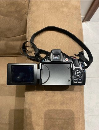 Cámara Canon con bolso y batería