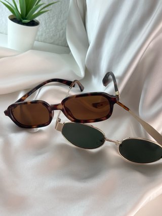 Gafas de sol doradas y marrones