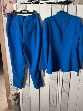 Traje azul chaqueta y pantalón tiro alto