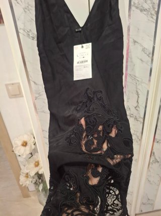 Top lencero Zara satinado con encaje
