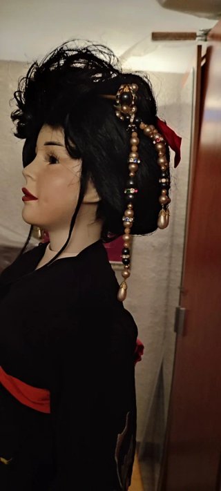 Muñeca de porcelana coleccionista