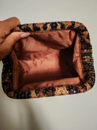 Pochette con paillettes maculato
