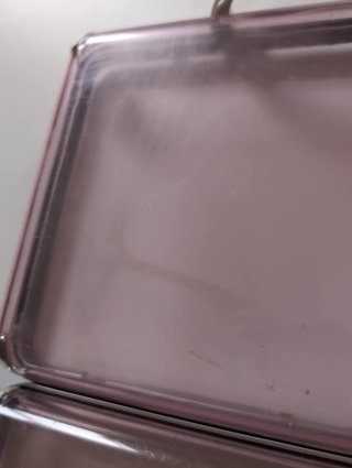 Caja de plástico transparente con asa