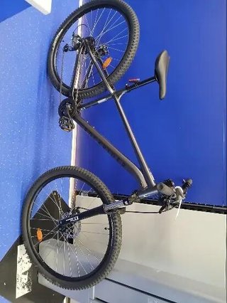 Bicicleta de montaña 29" Expl 100 gris suspensión delantera
