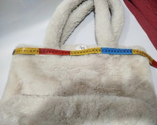 Bolso de pelo beige