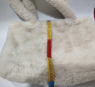 Bolso de pelo beige