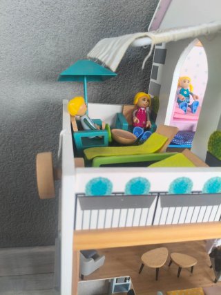 Casa de muñecas con accesorios
