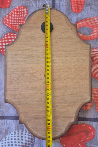 Cornice in legno marrone