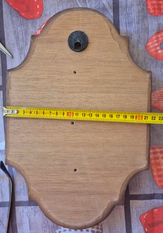 Cornice in legno marrone