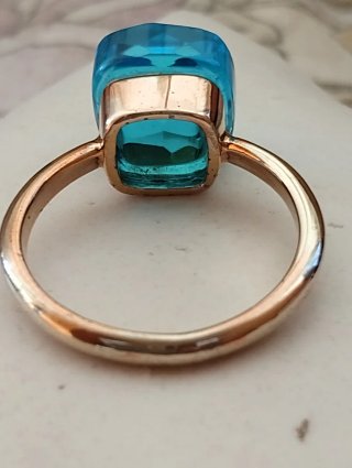 Anello argento placcato oro rosa topazio azzurro