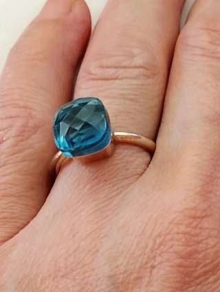 Anello argento placcato oro rosa topazio azzurro