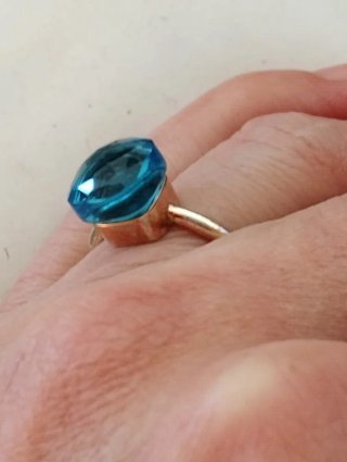 Anello argento placcato oro rosa topazio azzurro