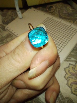 Anello argento placcato oro rosa topazio azzurro