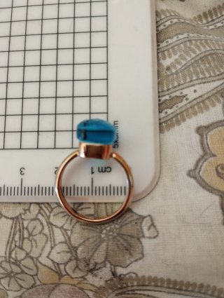 Anello argento placcato oro rosa topazio azzurro
