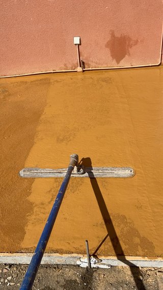 Pavimento hormigón impreso y pulido Muros