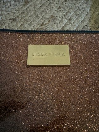 Bimba y Lola sobre fiesta glitter oro y turquesa