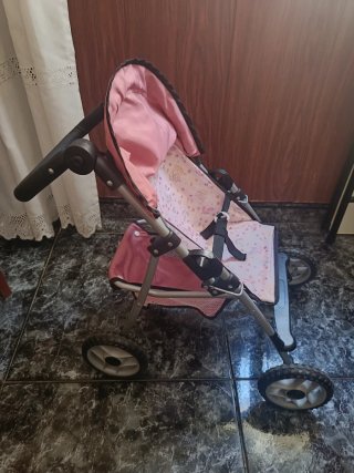 Carro de paseo para muñecas rosa