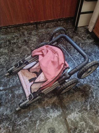 Carro de paseo para muñecas rosa